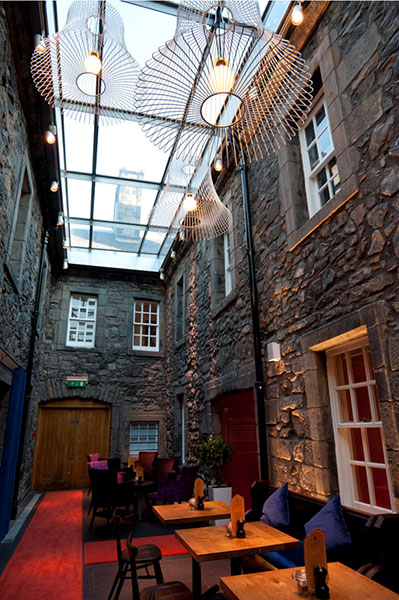 Merchant-and-Makers-Deadgood-Furniture-and-Lighting-14-Wire-Pendants-at-Benugo,-Edinburgh-Castle