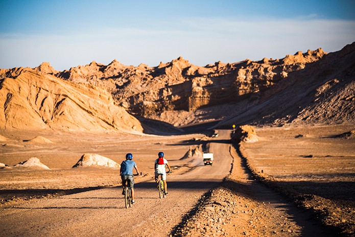 Cycling in Moon Valley, Valle de la Luna, Atacama Desert, North Chile. Image courtesy of Alto Atacama Desert Lodge & Spa.